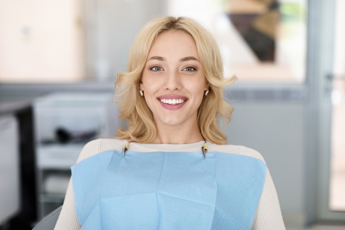 Female dental patients seating on dentist chair