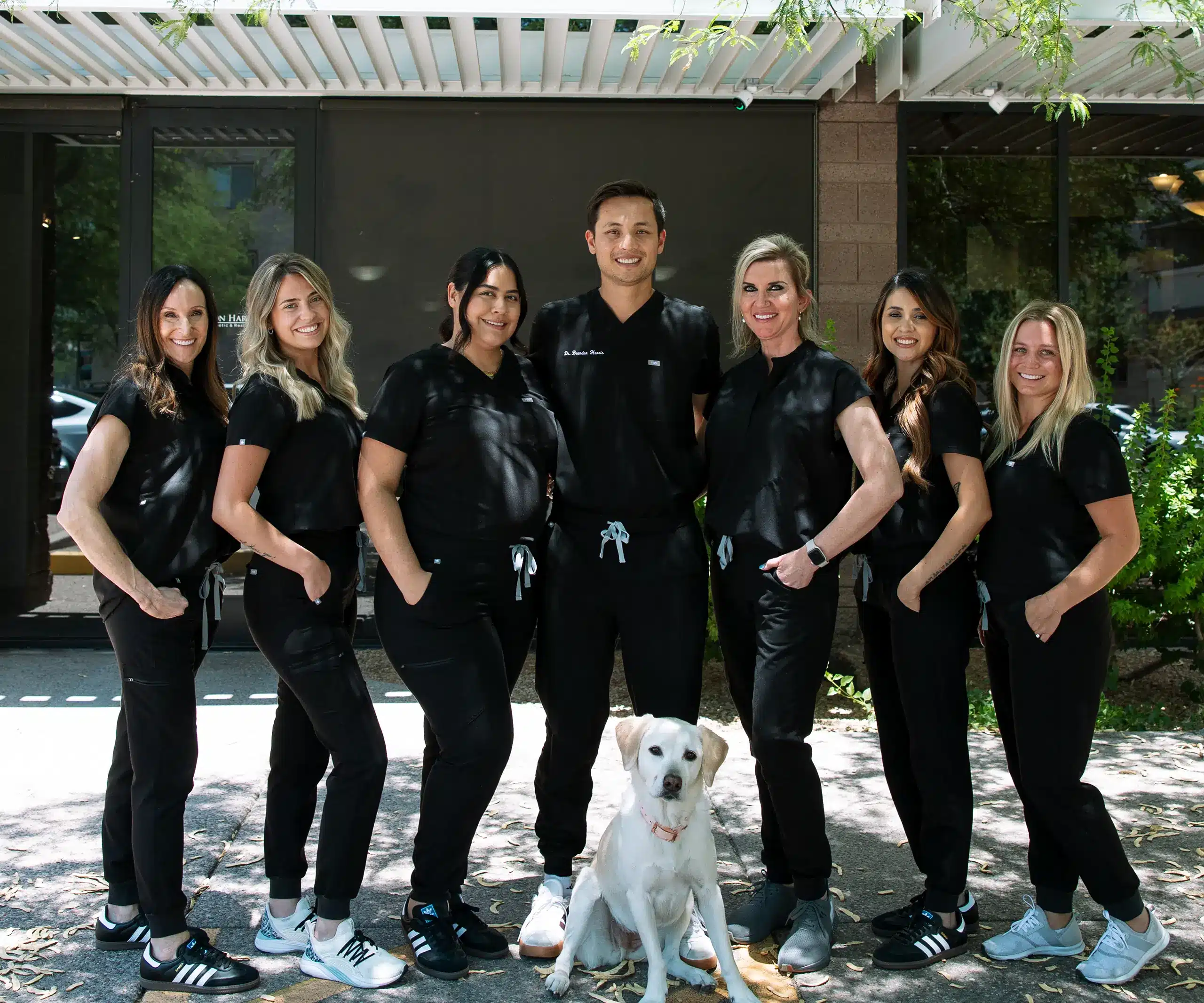 Smiling dental team members at Dr. Brandon Harris's office in Phoenix.