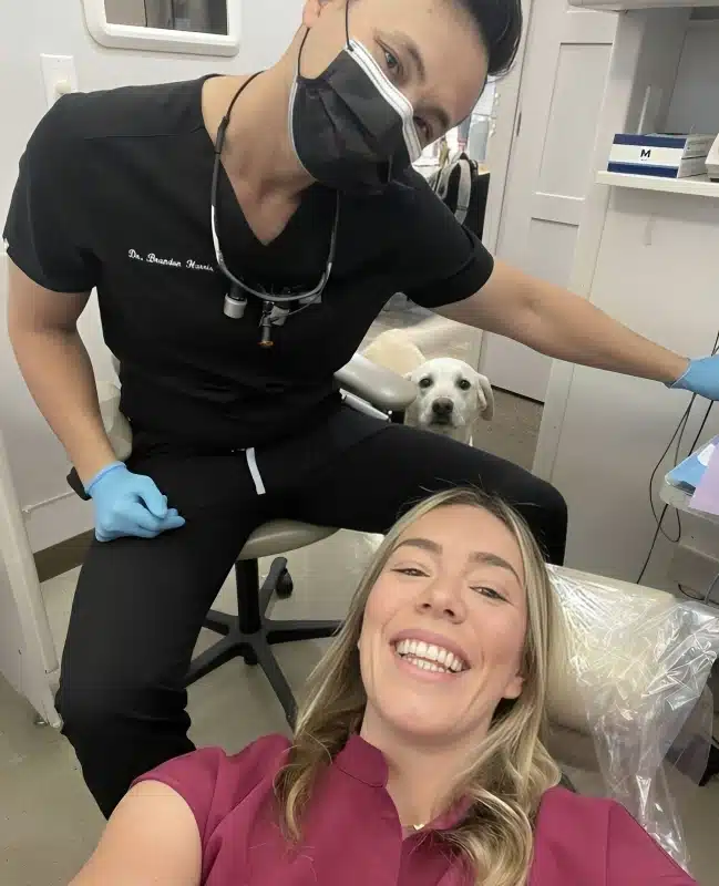 A patient smiling while having a dental treatment