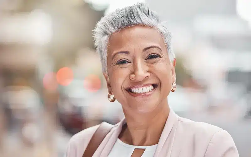 Elderly woman smiling confidently
