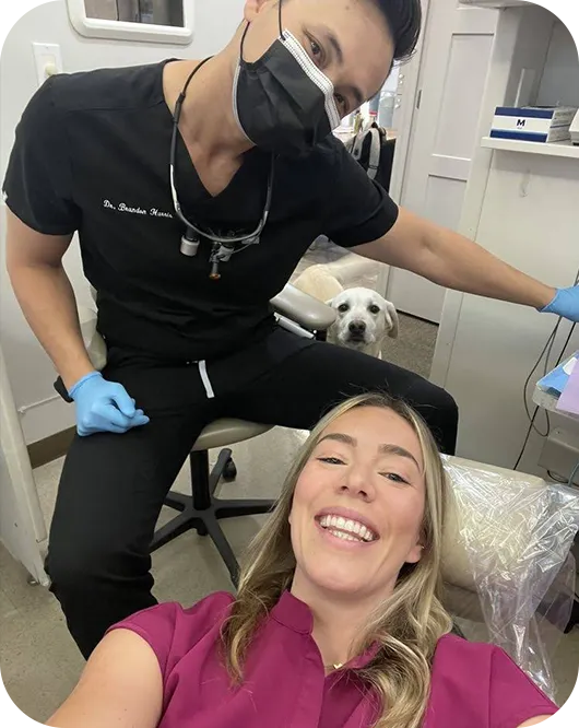 A patient smiling while having a dental treatment