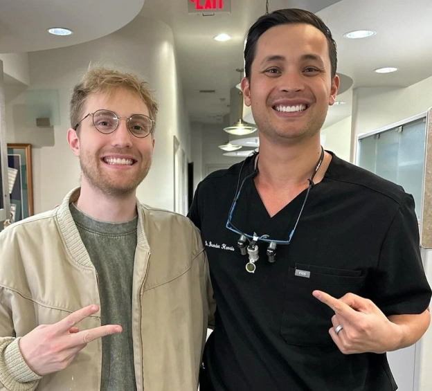 Dr. Brandon Harris with a patient at Biltmore Cosmetic & Restorative Dentistry next to text explaining cosmetic bonding in Phoenix.
